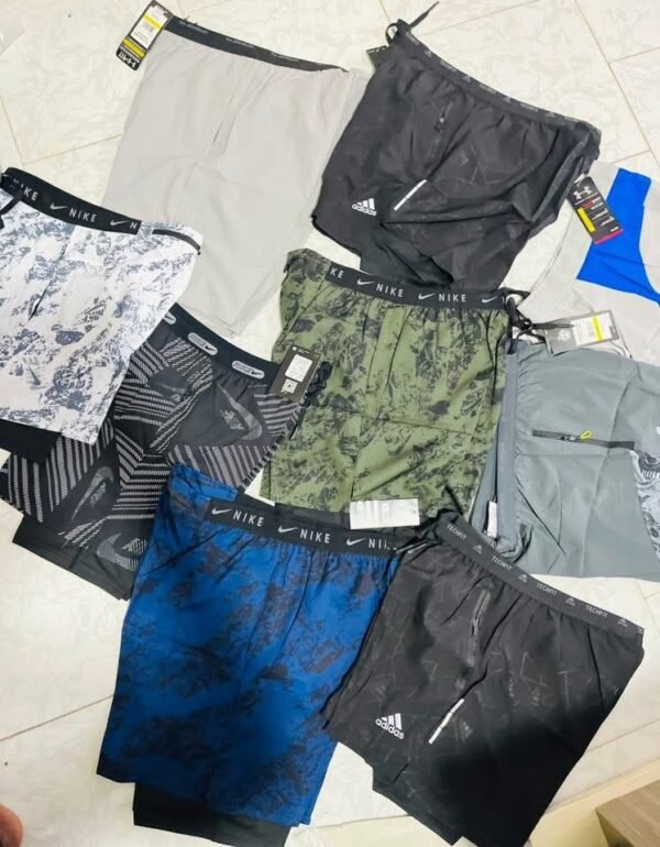 0beebe93-d6de-40ee-9502-5bef56e24dd3 Short sportif Nike / Adidas