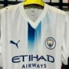 f2beeaf7-3dc2-429f-8b6e-e19cb379843f Maillot Manchester city