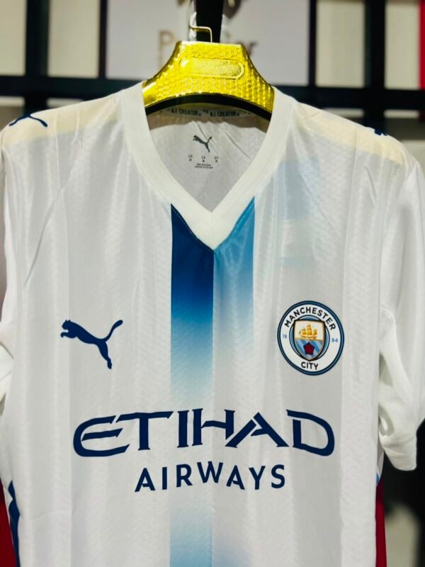 f2beeaf7-3dc2-429f-8b6e-e19cb379843f Maillot Manchester city